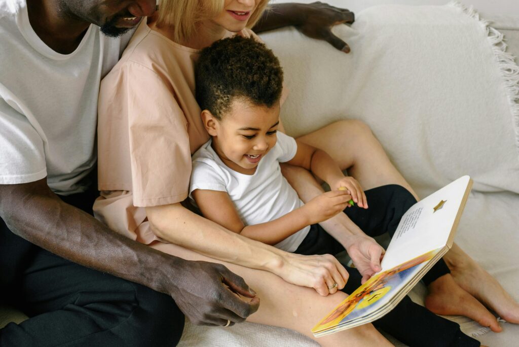 Diverse family reading together