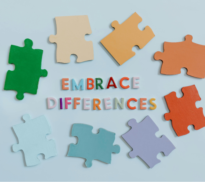 Puzzle pieces with the words embrace differences