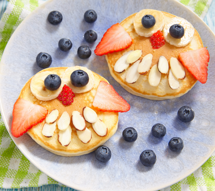 Pancakes with fruit to look like owls